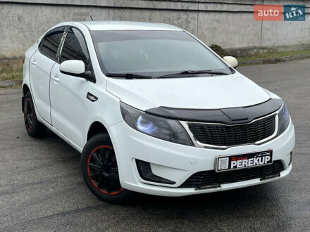 Белый Киа Рио, объемом двигателя 1.4 л и пробегом 246 тыс. км за 6550 $, фото 1 на Automoto.ua