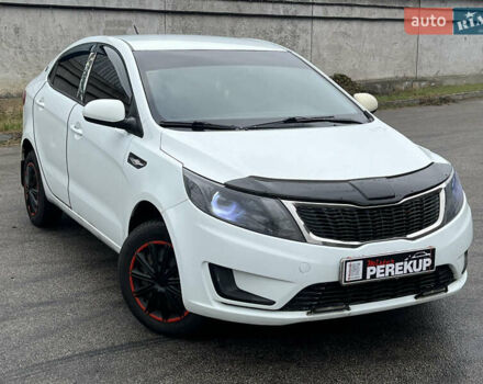 Белый Киа Рио, объемом двигателя 1.4 л и пробегом 246 тыс. км за 6550 $, фото 1 на Automoto.ua