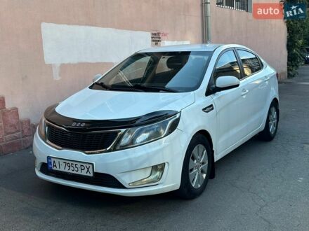 Білий Кіа Ріо, об'ємом двигуна 1.4 л та пробігом 212 тис. км за 6600 $, фото 1 на Automoto.ua