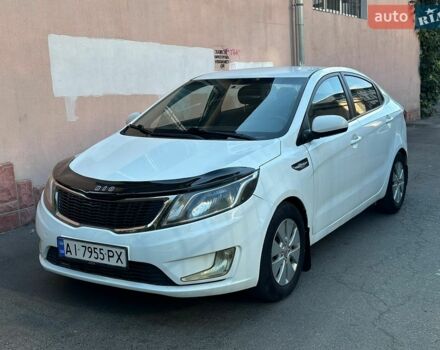 Білий Кіа Ріо, об'ємом двигуна 1.4 л та пробігом 212 тис. км за 6600 $, фото 1 на Automoto.ua