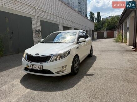 Белый Киа Рио, объемом двигателя 1.4 л и пробегом 143 тыс. км за 9199 $, фото 1 на Automoto.ua