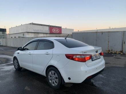 Белый Киа Рио, объемом двигателя 1.4 л и пробегом 87 тыс. км за 8555 $, фото 1 на Automoto.ua