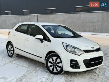 Білий Кіа Ріо, об'ємом двигуна 1.4 л та пробігом 65 тис. км за 12700 $, фото 1 на Automoto.ua