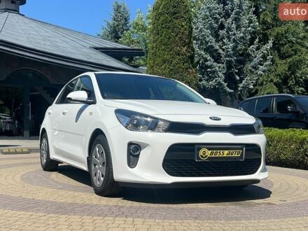 Білий Кіа Ріо, об'ємом двигуна 1.25 л та пробігом 64 тис. км за 13500 $, фото 1 на Automoto.ua