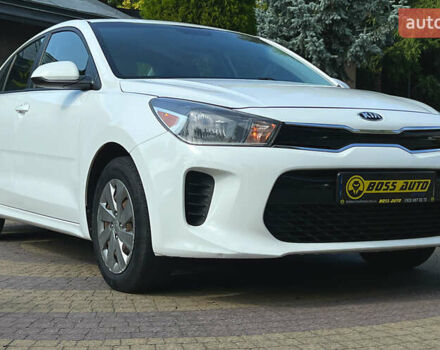 Белый Киа Рио, объемом двигателя 1.6 л и пробегом 142 тыс. км за 11999 $, фото 1 на Automoto.ua