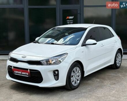 Белый Киа Рио, объемом двигателя 1.25 л и пробегом 73 тыс. км за 10700 $, фото 1 на Automoto.ua