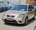 Бежевый Киа Рио, объемом двигателя 1.4 л и пробегом 123 тыс. км за 5090 $, фото 1 на Automoto.ua