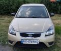 Бежевый Киа Рио, объемом двигателя 1.4 л и пробегом 122 тыс. км за 5200 $, фото 1 на Automoto.ua