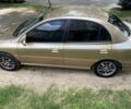Бежевый Киа Рио, объемом двигателя 1.3 л и пробегом 200 тыс. км за 850 $, фото 1 на Automoto.ua