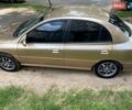 Бежевий Кіа Ріо, об'ємом двигуна 1.3 л та пробігом 200 тис. км за 900 $, фото 4 на Automoto.ua