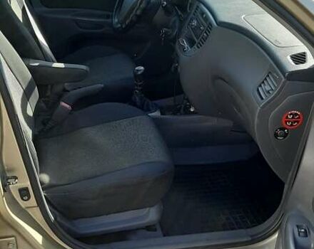 Бежевый Киа Рио, объемом двигателя 1.4 л и пробегом 250 тыс. км за 4900 $, фото 5 на Automoto.ua