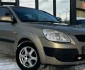 Бежевий Кіа Ріо, об'ємом двигуна 1.4 л та пробігом 199 тис. км за 3850 $, фото 1 на Automoto.ua