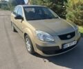 Бежевый Киа Рио, объемом двигателя 1.4 л и пробегом 230 тыс. км за 3916 $, фото 1 на Automoto.ua