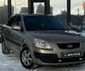 Бежевий Кіа Ріо, об'ємом двигуна 1.4 л та пробігом 199 тис. км за 3850 $, фото 1 на Automoto.ua