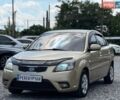 Бежевый Киа Рио, объемом двигателя 1.5 л и пробегом 245 тыс. км за 4900 $, фото 1 на Automoto.ua