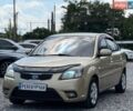 Бежевый Киа Рио, объемом двигателя 1.5 л и пробегом 245 тыс. км за 4750 $, фото 1 на Automoto.ua