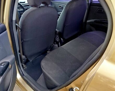 Бежевый Киа Рио, объемом двигателя 1.4 л и пробегом 182 тыс. км за 3800 $, фото 5 на Automoto.ua