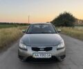 Бежевый Киа Рио, объемом двигателя 1.4 л и пробегом 211 тыс. км за 4550 $, фото 1 на Automoto.ua