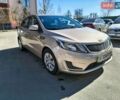 Бежевий Кіа Ріо, об'ємом двигуна 1.4 л та пробігом 85 тис. км за 6900 $, фото 1 на Automoto.ua
