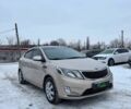 Бежевий Кіа Ріо, об'ємом двигуна 1.6 л та пробігом 162 тис. км за 5999 $, фото 1 на Automoto.ua