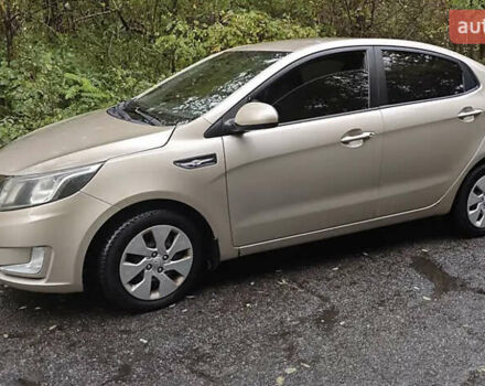 Бежевый Киа Рио, объемом двигателя 1.4 л и пробегом 187 тыс. км за 6550 $, фото 2 на Automoto.ua