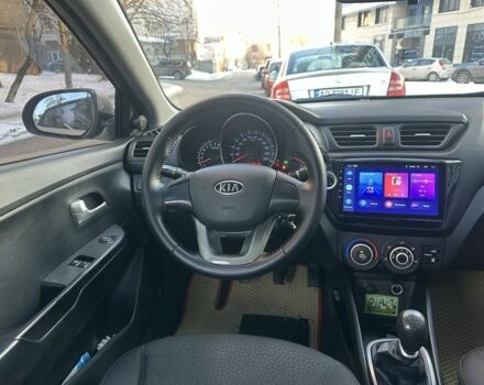 Бежевий Кіа Ріо, об'ємом двигуна 1.4 л та пробігом 187 тис. км за 5600 $, фото 13 на Automoto.ua
