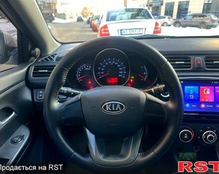 Бежевий Кіа Ріо, об'ємом двигуна 1.4 л та пробігом 18700 тис. км за 5600 $, фото 8 на Automoto.ua