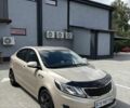 Бежевый Киа Рио, объемом двигателя 1.4 л и пробегом 125 тыс. км за 7456 $, фото 1 на Automoto.ua
