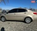 Бежевий Кіа Ріо, об'ємом двигуна 1.4 л та пробігом 66 тис. км за 7500 $, фото 6 на Automoto.ua