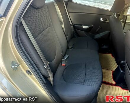 Бежевий Кіа Ріо, об'ємом двигуна 1.4 л та пробігом 18700 тис. км за 5600 $, фото 5 на Automoto.ua