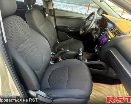 Бежевий Кіа Ріо, об'ємом двигуна 1.4 л та пробігом 18700 тис. км за 5600 $, фото 6 на Automoto.ua