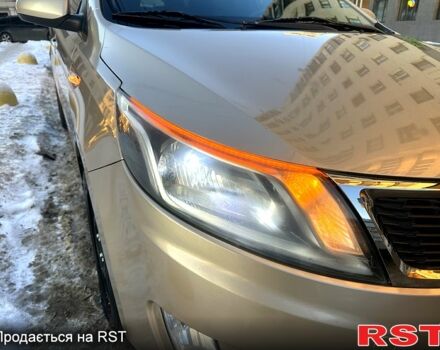 Бежевий Кіа Ріо, об'ємом двигуна 1.4 л та пробігом 18700 тис. км за 5600 $, фото 11 на Automoto.ua