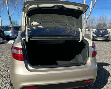 Бежевий Кіа Ріо, об'ємом двигуна 1.4 л та пробігом 66 тис. км за 7500 $, фото 10 на Automoto.ua