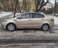 Бежевий Кіа Ріо, об'ємом двигуна 1.4 л та пробігом 128 тис. км за 6600 $, фото 1 на Automoto.ua