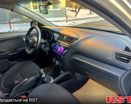 Бежевий Кіа Ріо, об'ємом двигуна 1.4 л та пробігом 18700 тис. км за 5600 $, фото 7 на Automoto.ua