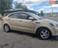 Бежевый Киа Рио, объемом двигателя 1.4 л и пробегом 162 тыс. км за 6800 $, фото 2 на Automoto.ua