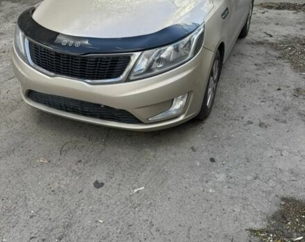 Бежевий Кіа Ріо, об'ємом двигуна 1.6 л та пробігом 175 тис. км за 7080 $, фото 1 на Automoto.ua