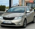Бежевый Киа Рио, объемом двигателя 1.4 л и пробегом 217 тыс. км за 8299 $, фото 1 на Automoto.ua