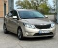 Бежевый Киа Рио, объемом двигателя 1.4 л и пробегом 217 тыс. км за 8299 $, фото 1 на Automoto.ua