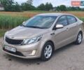 Бежевий Кіа Ріо, об'ємом двигуна 1.4 л та пробігом 13 тис. км за 10500 $, фото 1 на Automoto.ua