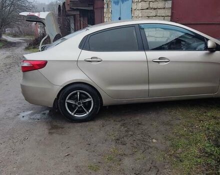 Бежевый Киа Рио, объемом двигателя 1.4 л и пробегом 169 тыс. км за 7000 $, фото 1 на Automoto.ua