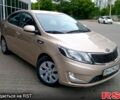 Бежевый Киа Рио, объемом двигателя 1.4 л и пробегом 160 тыс. км за 10600 $, фото 1 на Automoto.ua