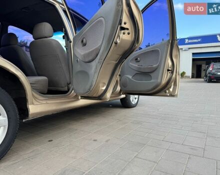 Бежевый Киа Рио, объемом двигателя 1.4 л и пробегом 229 тыс. км за 2450 $, фото 11 на Automoto.ua