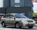 Бежевий Кіа Ріо, об'ємом двигуна 1.34 л та пробігом 134 тис. км за 3999 $, фото 25 на Automoto.ua