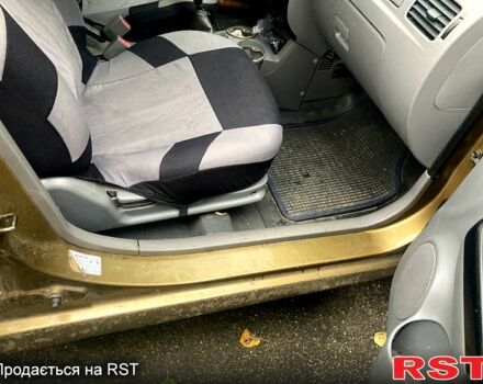 Бежевий Кіа Ріо, об'ємом двигуна 1.4 л та пробігом 201 тис. км за 4500 $, фото 9 на Automoto.ua