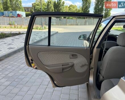 Бежевий Кіа Ріо, об'ємом двигуна 1.34 л та пробігом 134 тис. км за 3999 $, фото 68 на Automoto.ua