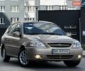 Бежевий Кіа Ріо, об'ємом двигуна 1.34 л та пробігом 134 тис. км за 3999 $, фото 23 на Automoto.ua