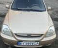 Бежевый Киа Рио, объемом двигателя 1.4 л и пробегом 290 тыс. км за 1700 $, фото 1 на Automoto.ua