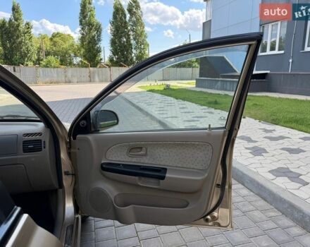 Бежевий Кіа Ріо, об'ємом двигуна 1.34 л та пробігом 134 тис. км за 3999 $, фото 50 на Automoto.ua