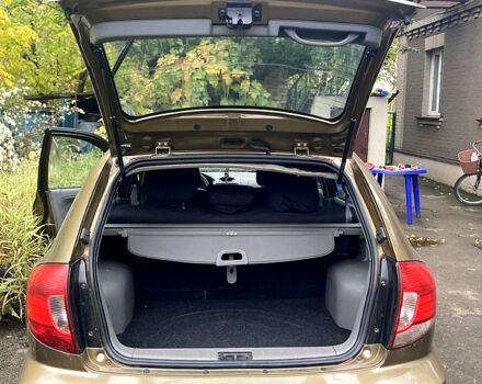 Бежевий Кіа Ріо, об'ємом двигуна 1.4 л та пробігом 201 тис. км за 4500 $, фото 5 на Automoto.ua